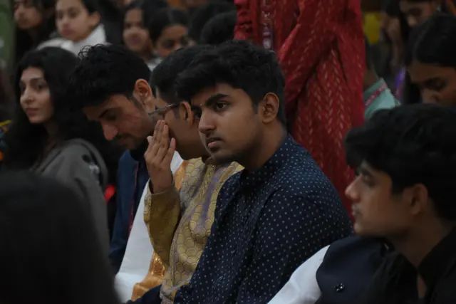 Delegates listen as a speech is given.